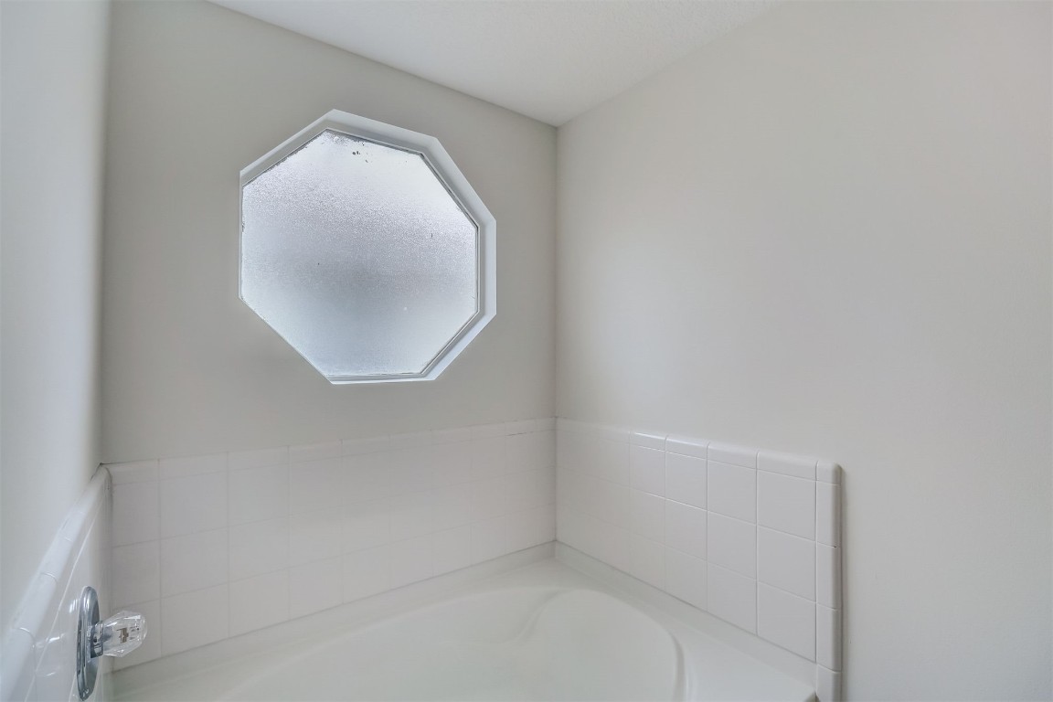 96099 Starlight Lane Yulee, FL 32097 - Photo 17 of 36 an empty room with a mirror