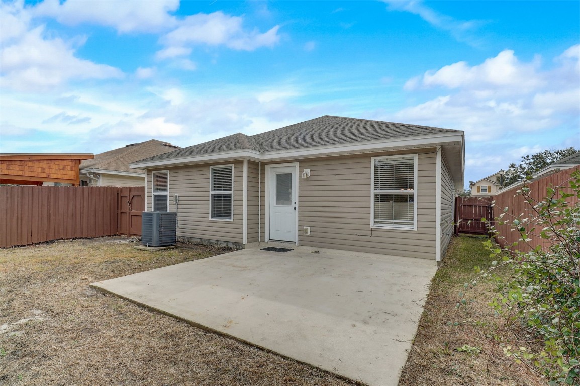 96099 Starlight Lane Yulee, FL 32097 - Photo 28 of 36 front view of a house with a yard