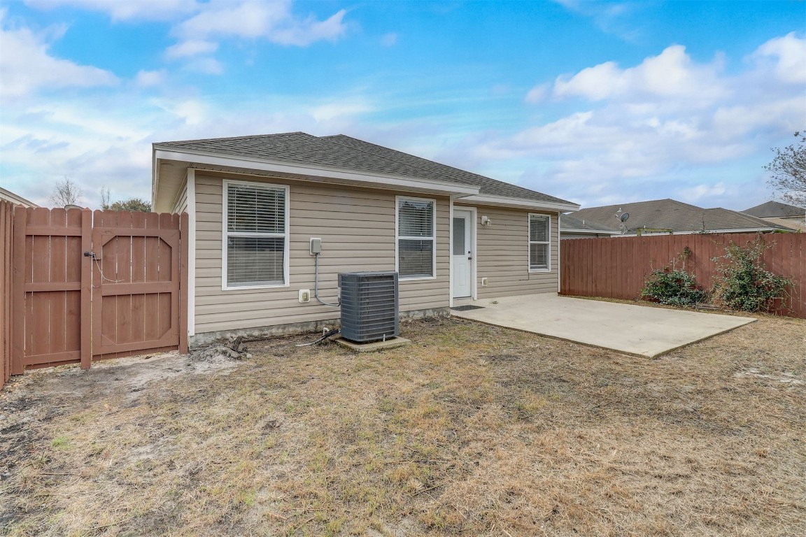 96099 Starlight Lane Yulee, FL 32097 - Photo 30 of 36 a view of backyard of house
