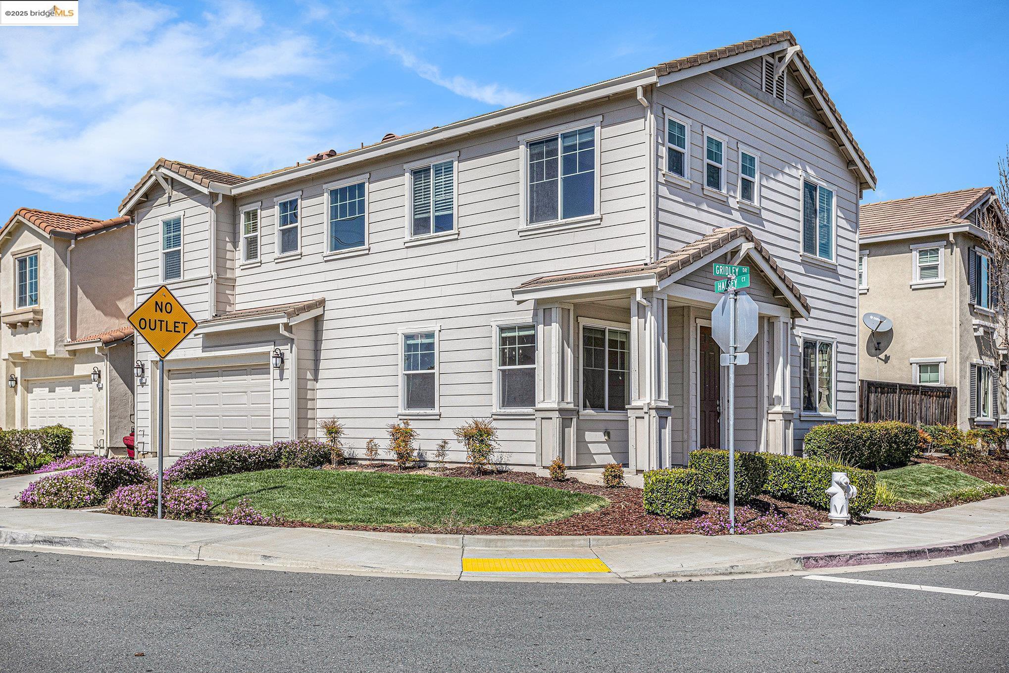 175 Halsey Way Pittsburg, CA 94565 - Photo 3 of 33 a front view of a house with a yard and potted plants
