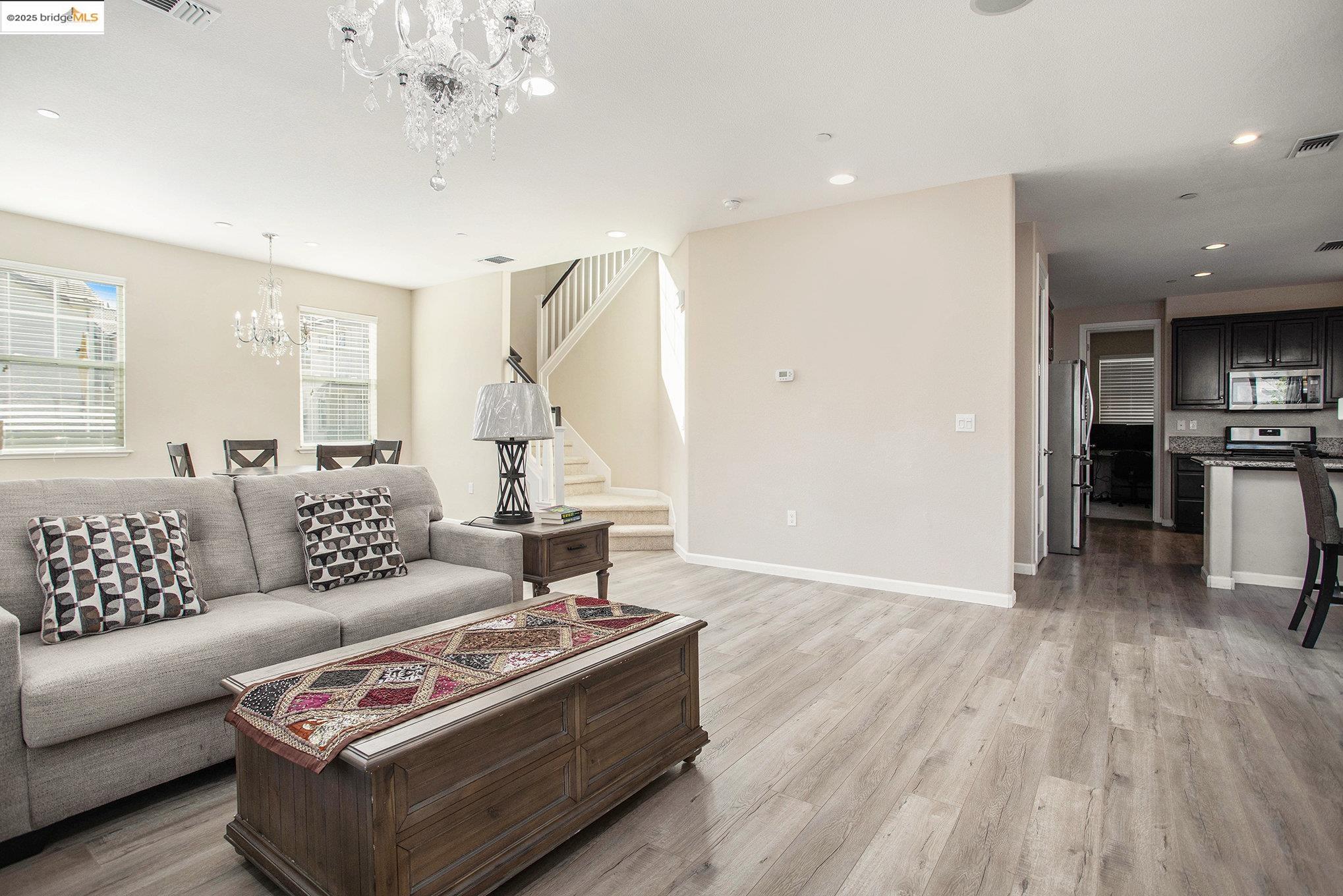 175 Halsey Way Pittsburg, CA 94565 - Photo 10 of 33 a living room with furniture and wooden floor