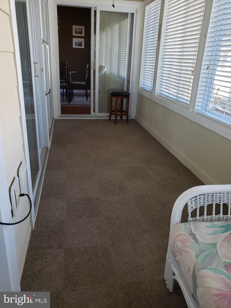 13 Pecan Court, Unit 67G Lewes, DE 19958 - Photo 12 of 25 a view of livingroom with furniture and windows
