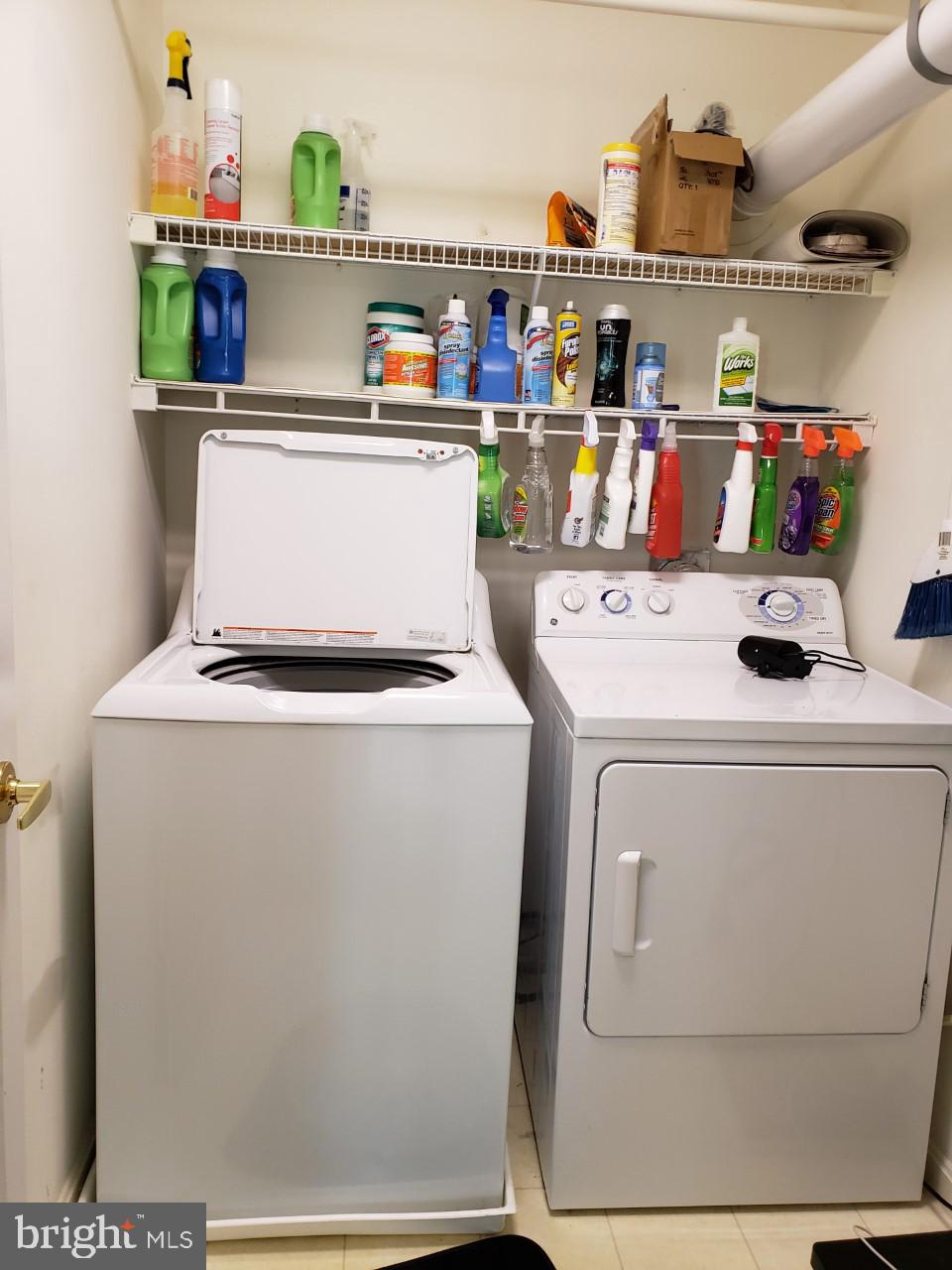 13 Pecan Court, Unit 67G Lewes, DE 19958 - Photo 6 of 25 a utility room with dryer and washer
