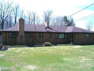 10395 Thwing Road Chardon, OH 44024 - Photo 1 of 5 Enjoy this well maintained brick ranch sitting on a beautifully treed 5+ acre lot.