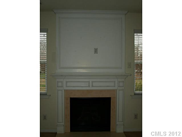9942 Caldwell Depot Road Cornelius, NC 28031 - Photo 6 of 9 a close up of a fireplace