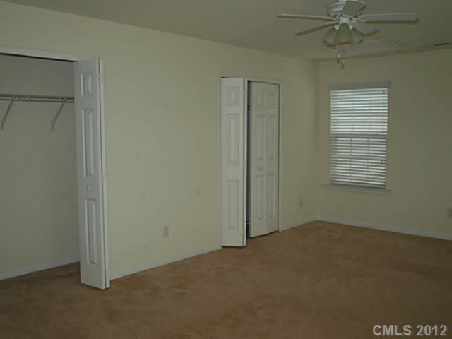 9942 Caldwell Depot Road Cornelius, NC 28031 - Photo 8 of 9 a view of an empty room with a window