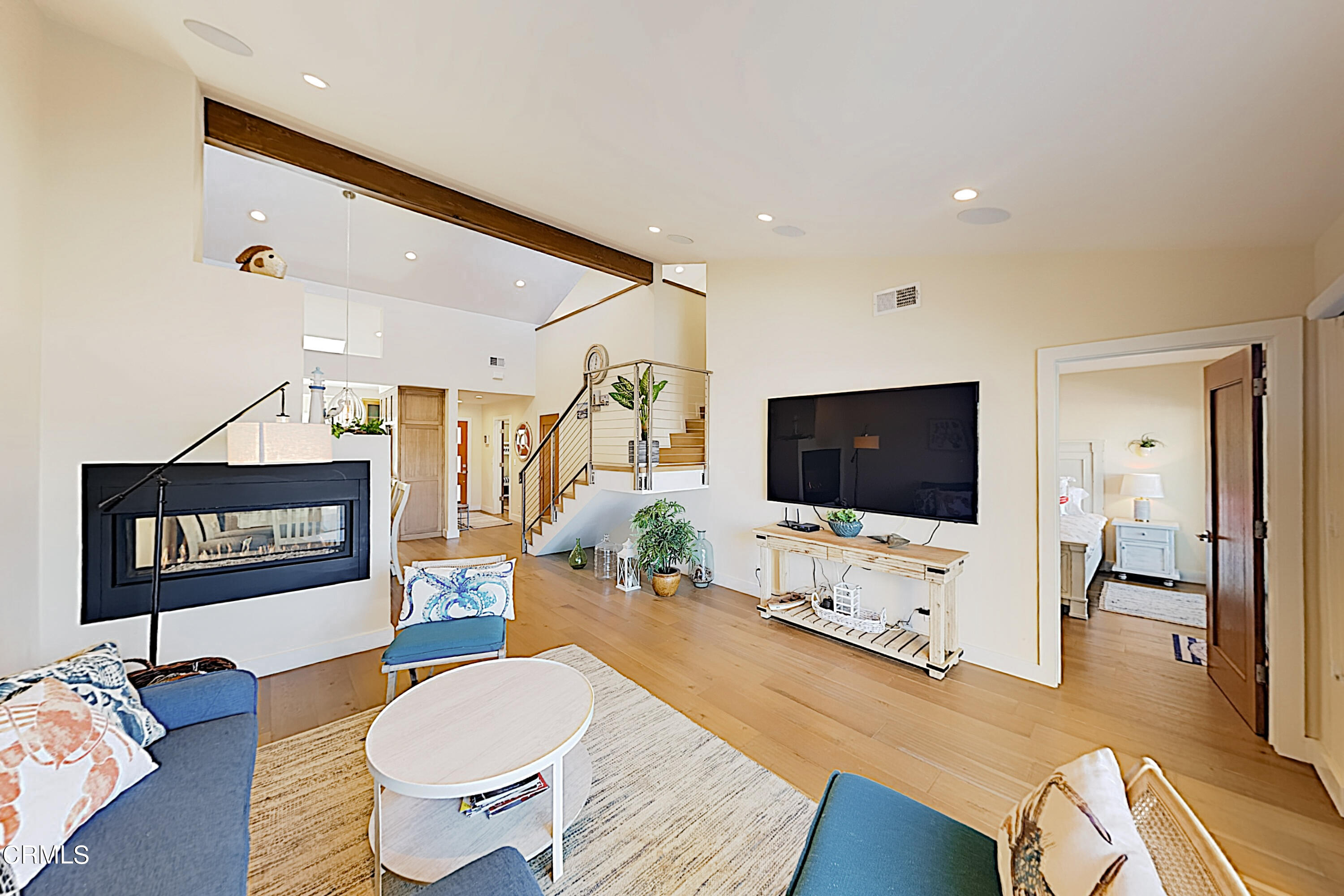 4531 Costa De Oro Oxnard, CA 93035 - Photo 19 of 26 a living room with furniture and a flat screen tv