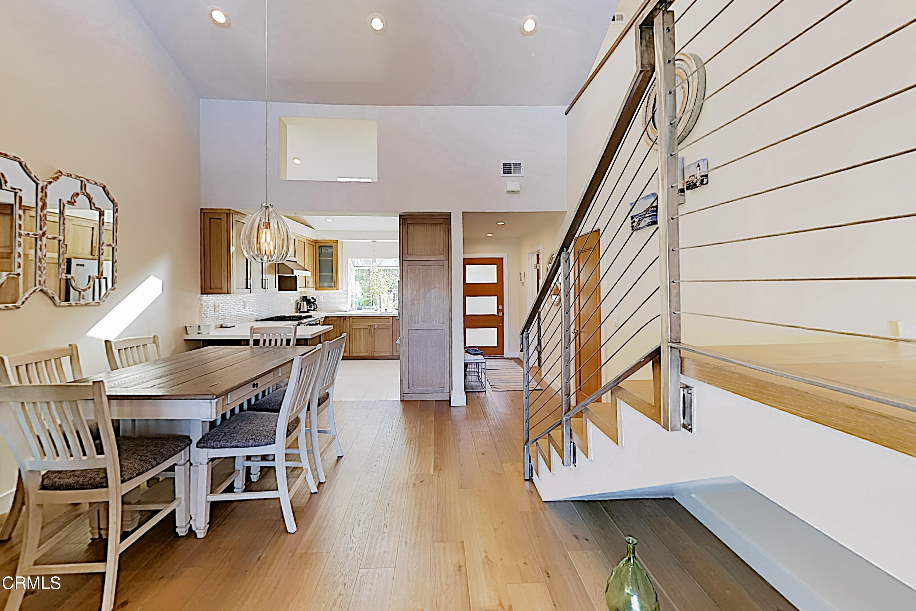4531 Costa De Oro Oxnard, CA 93035 - Photo 2 of 26 a view of a dining room with furniture and wooden floor