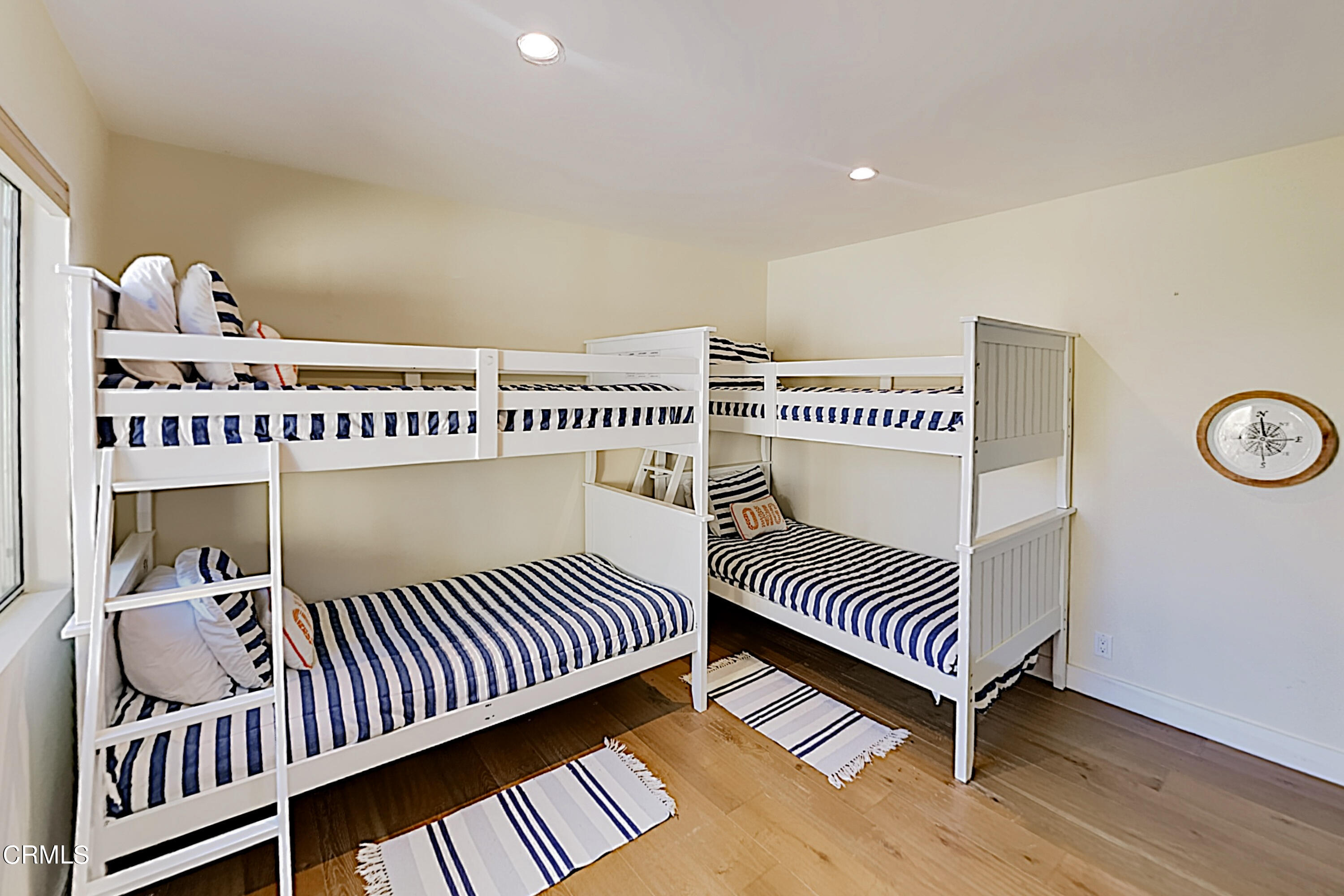 4531 Costa De Oro Oxnard, CA 93035 - Photo 5 of 26 a view of a bedroom with wooden floor