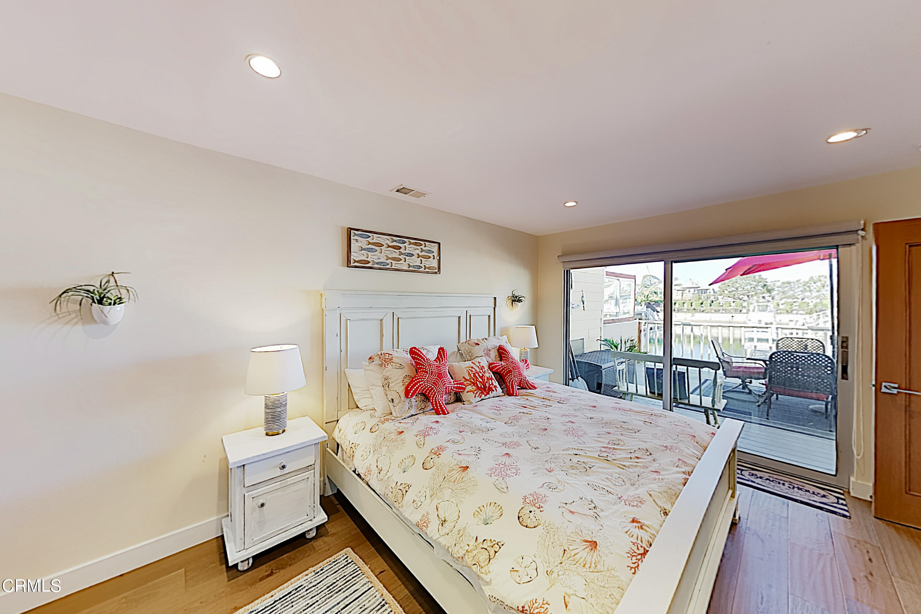 4531 Costa De Oro Oxnard, CA 93035 - Photo 9 of 26 a bed room with a bed and a large window