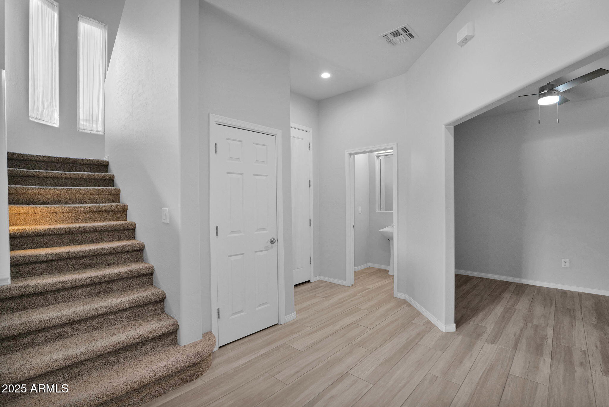 16420 North Thompson Peak Parkway, Unit 1057 Scottsdale, AZ 85260 - Photo 15 of 39 a view of entryway with wooden floor