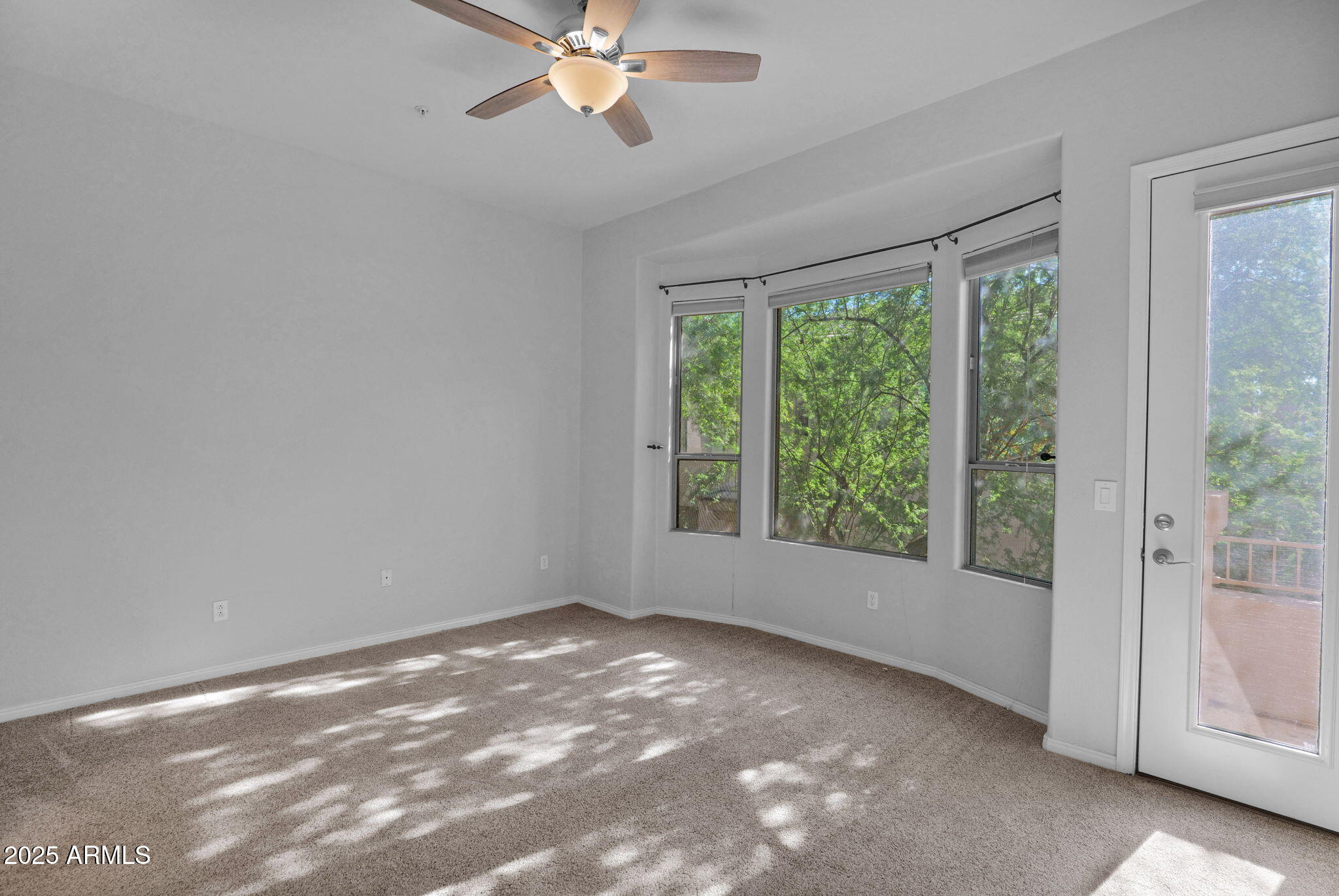 16420 North Thompson Peak Parkway, Unit 1057 Scottsdale, AZ 85260 - Photo 16 of 39 a view of an empty room with a window