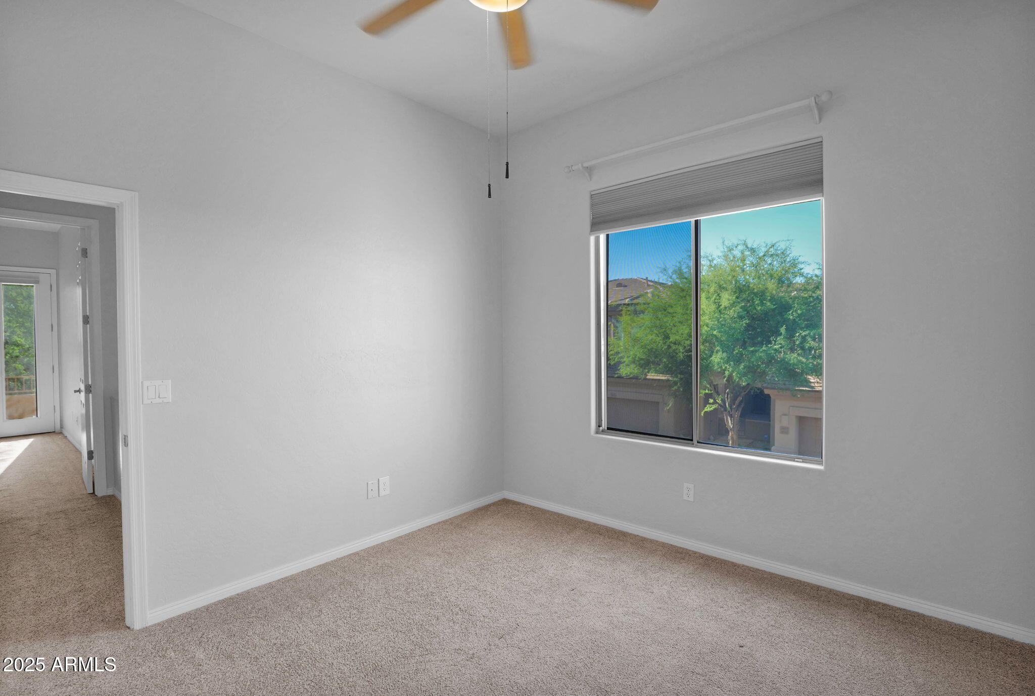 16420 North Thompson Peak Parkway, Unit 1057 Scottsdale, AZ 85260 - Photo 23 of 39 an empty room with a window