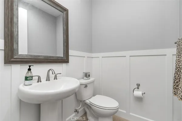 a view of a backyard with chairs