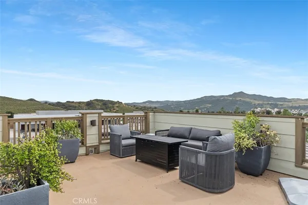a view of a terrace with a lake view