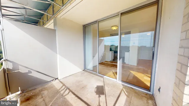 a bathroom with a glass shower door and a bathtub