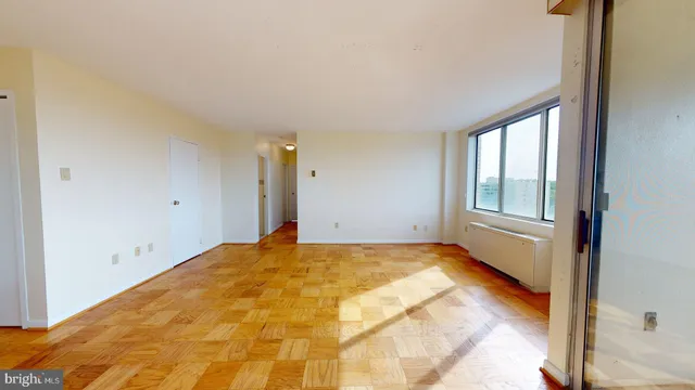 a view of an empty room and window