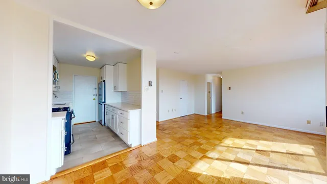 a view of a kitchen with a sink
