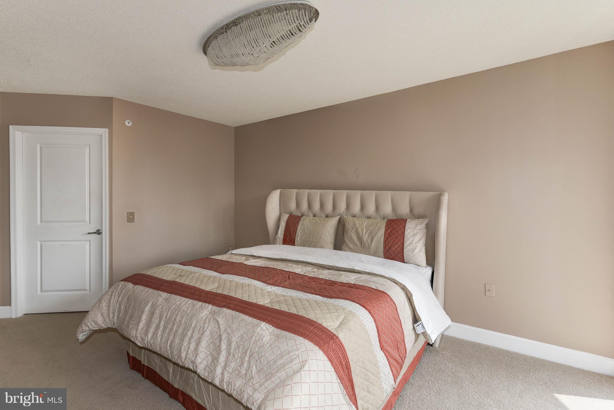 11800 Sunset Hills Road, Unit 314 Reston, VA 20190 - Photo 9 of 30 a bedroom with a bed and window