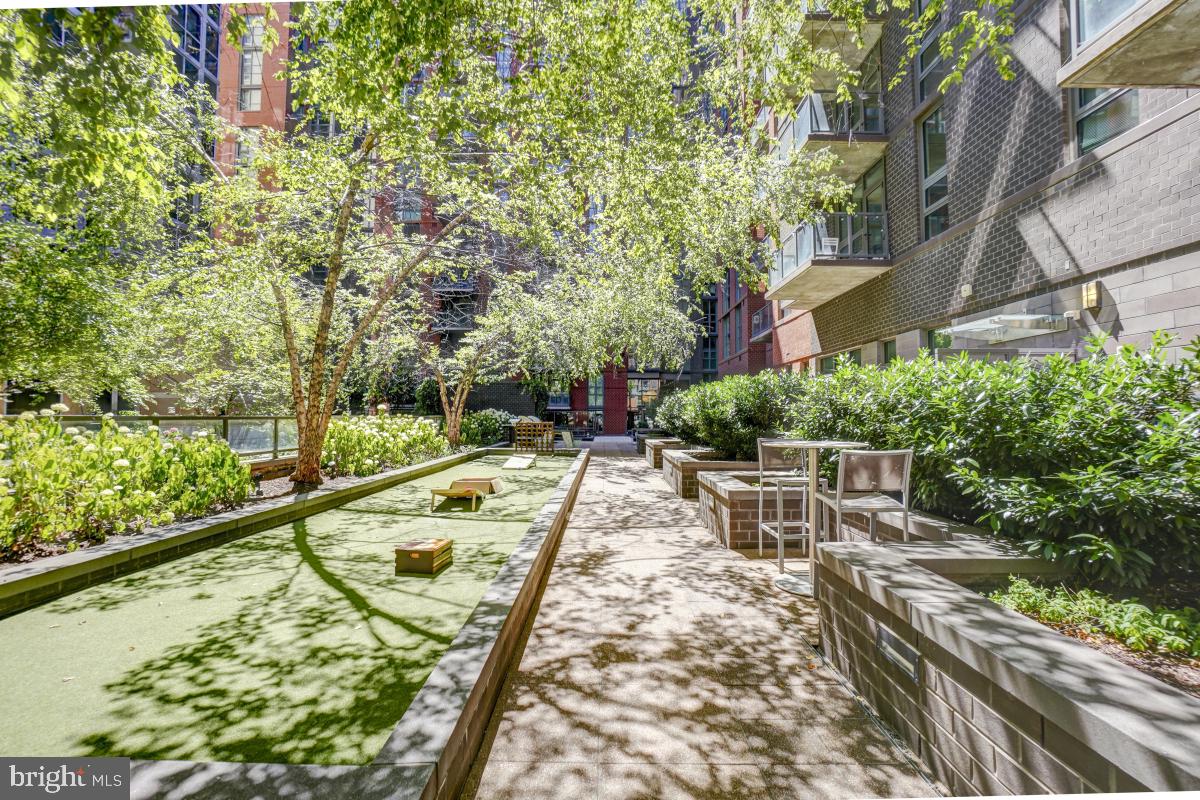 1025 First Street Southeast, Unit 1302 Washington, DC 20003 - Photo 31 of 43 a view of swimming pool with a patio