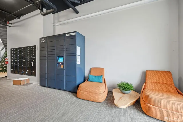 a view of a bedroom with bed and cupboard