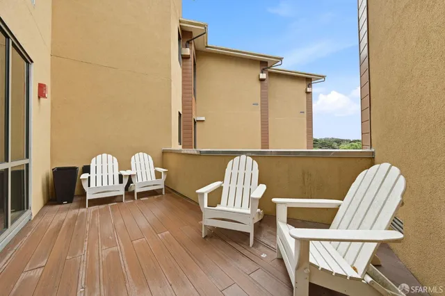 a backyard of a house with seating space