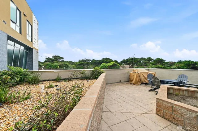 a front view of a building and outdoor space