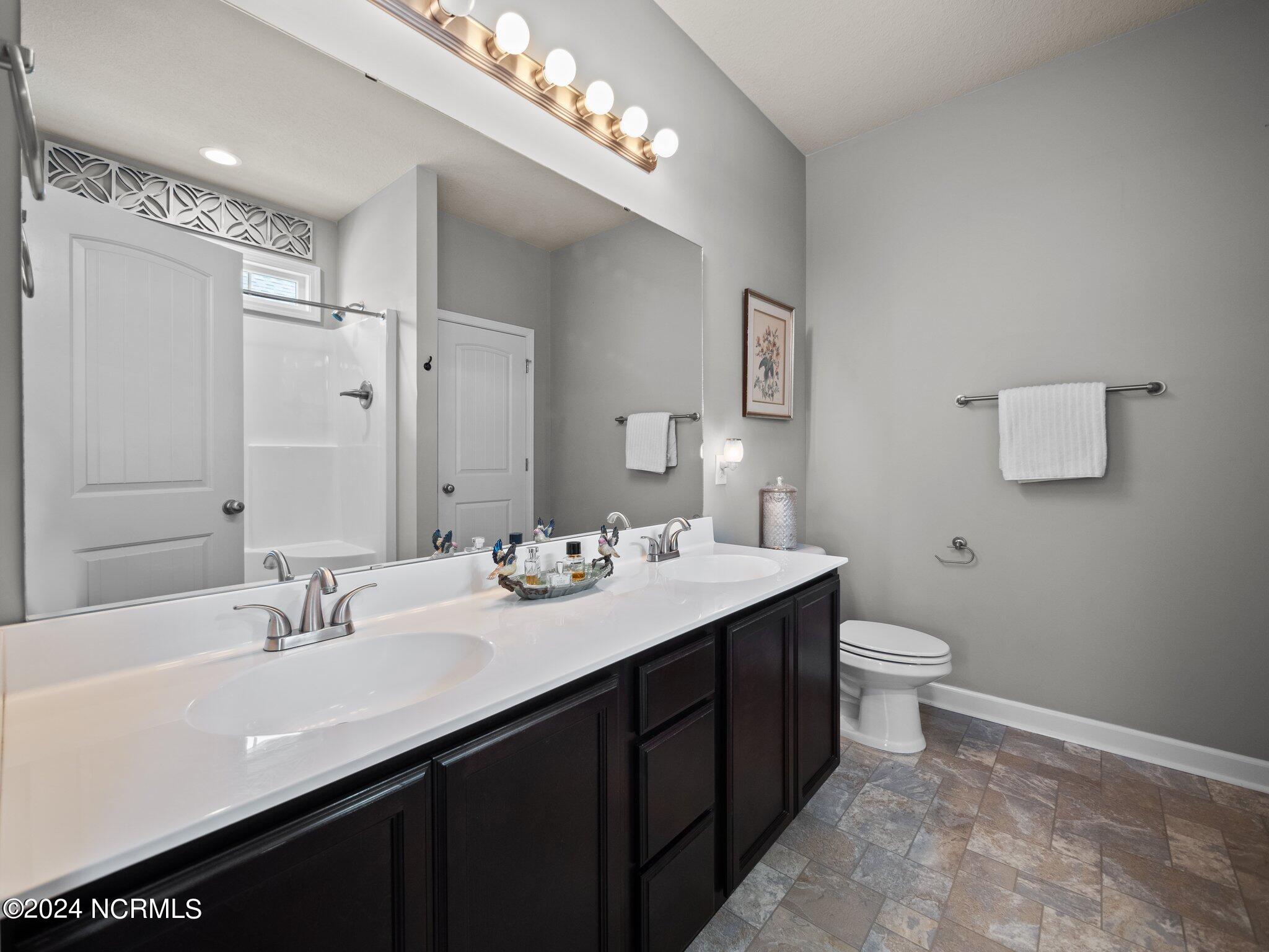 378 Frisco Way Holly Ridge, NC 28445 - Photo 29 of 49 Primary Bathroom