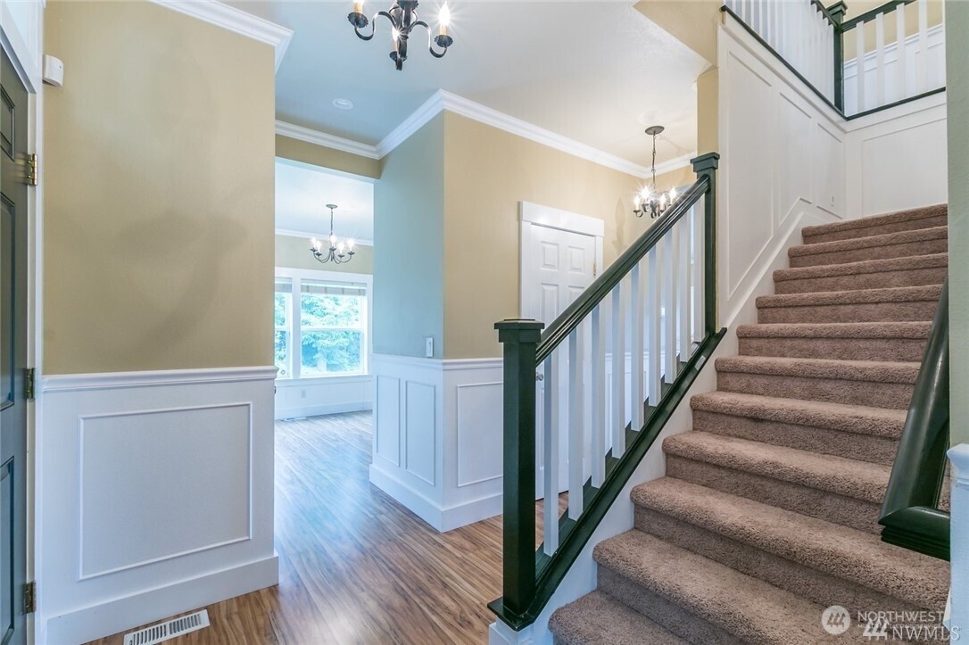 16619 249th Street East Orting, WA 98360 - Photo 7 of 21 a view of entryway and hall with wooden floor