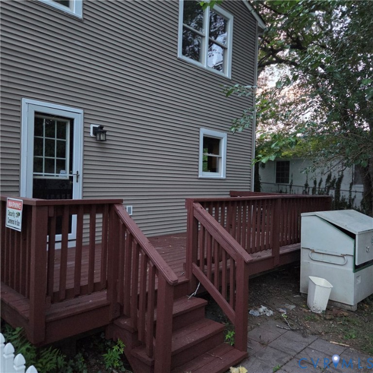 124 Lipscomb Street Richmond, VA 23224 - Photo 9 of 10 Rear exterior featuring horizontal siding, a multi