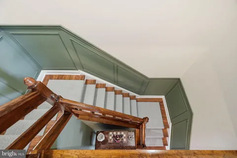 a view of a hallway with the wooden floor