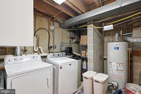 a front view of a house with garden and deck