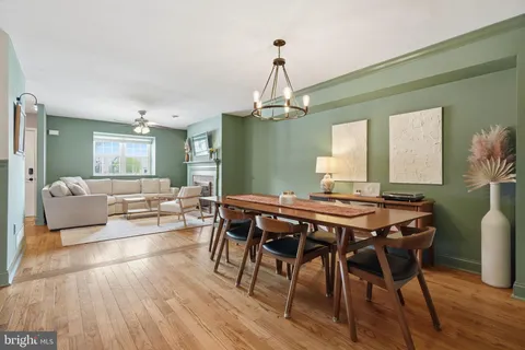 a view of a livingroom with furniture and wooden floor