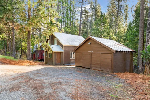 a workspace with furniture and a potted plant