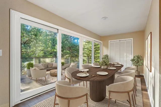 an empty room with windows and closet