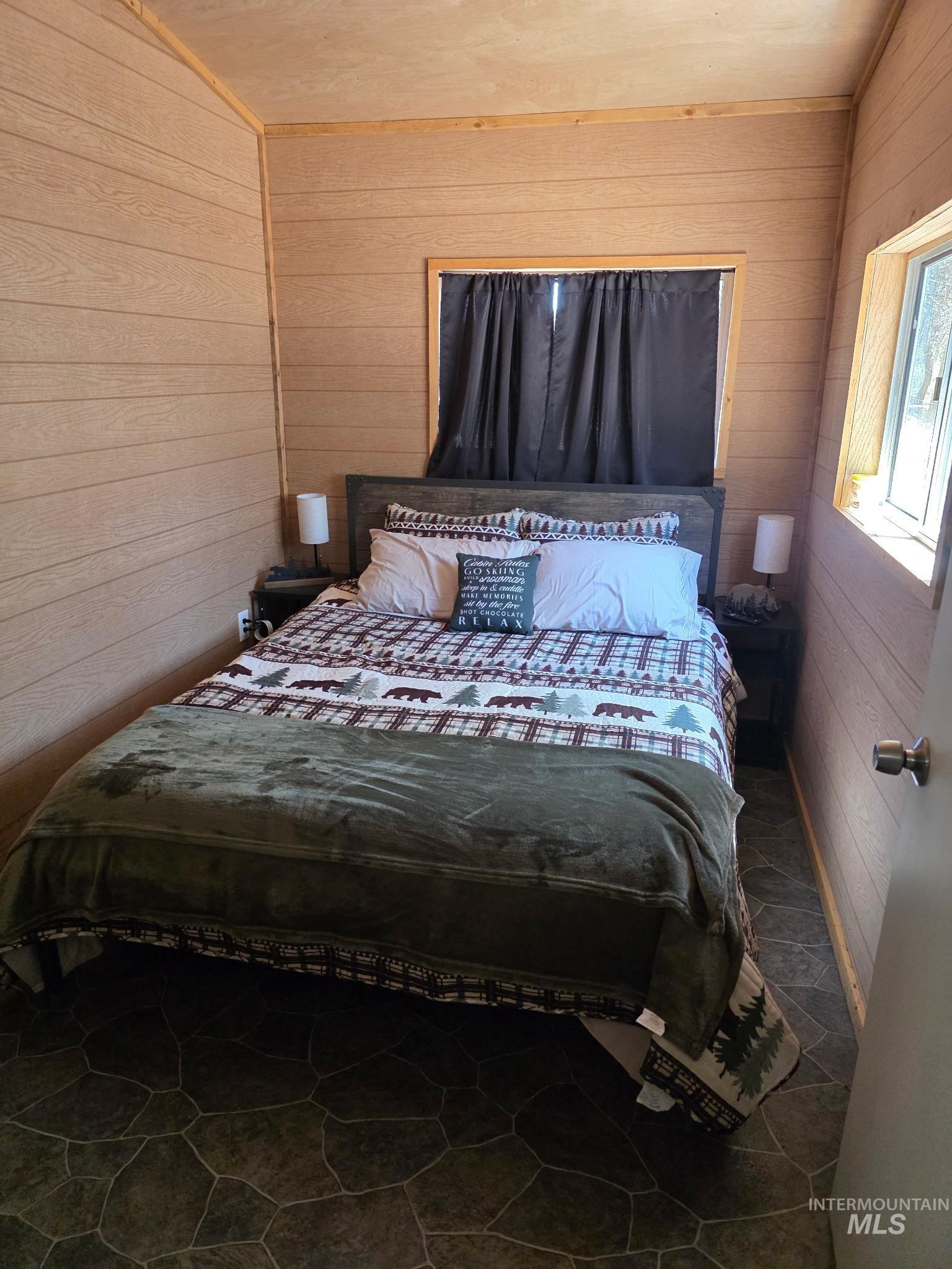 12 Woods Lane Boise, ID 83716 - Photo 7 of 9 Bedroom with wood walls