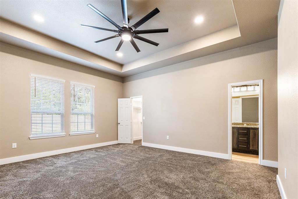 413 Henderson Street Bonham, TX 75418 - Photo 16 of 27 a view of an empty room with a window