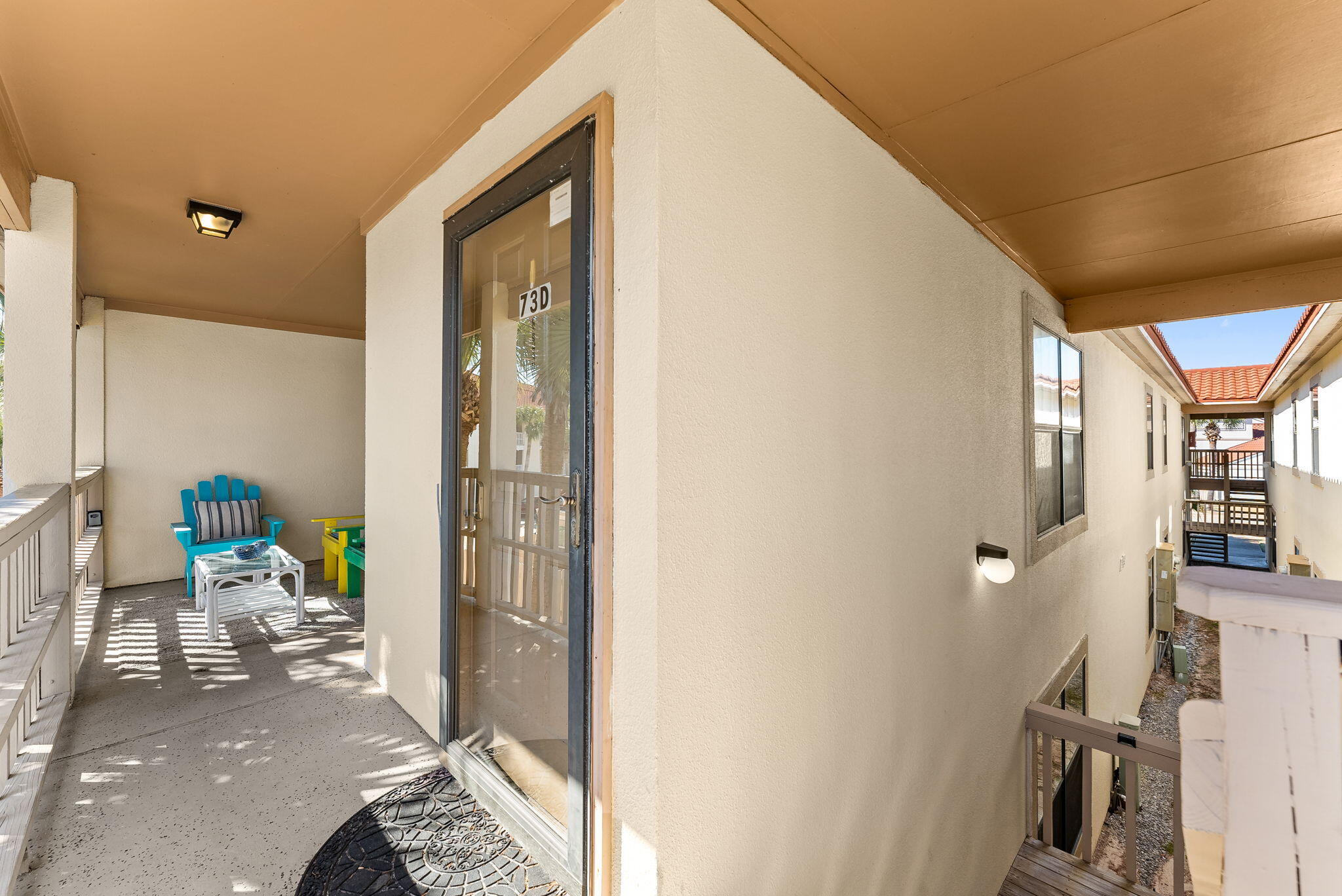 17462 Front Beach Road, Unit 73D Panama City Beach, FL 32413 - Photo 23 of 30 a living room with furniture and a window