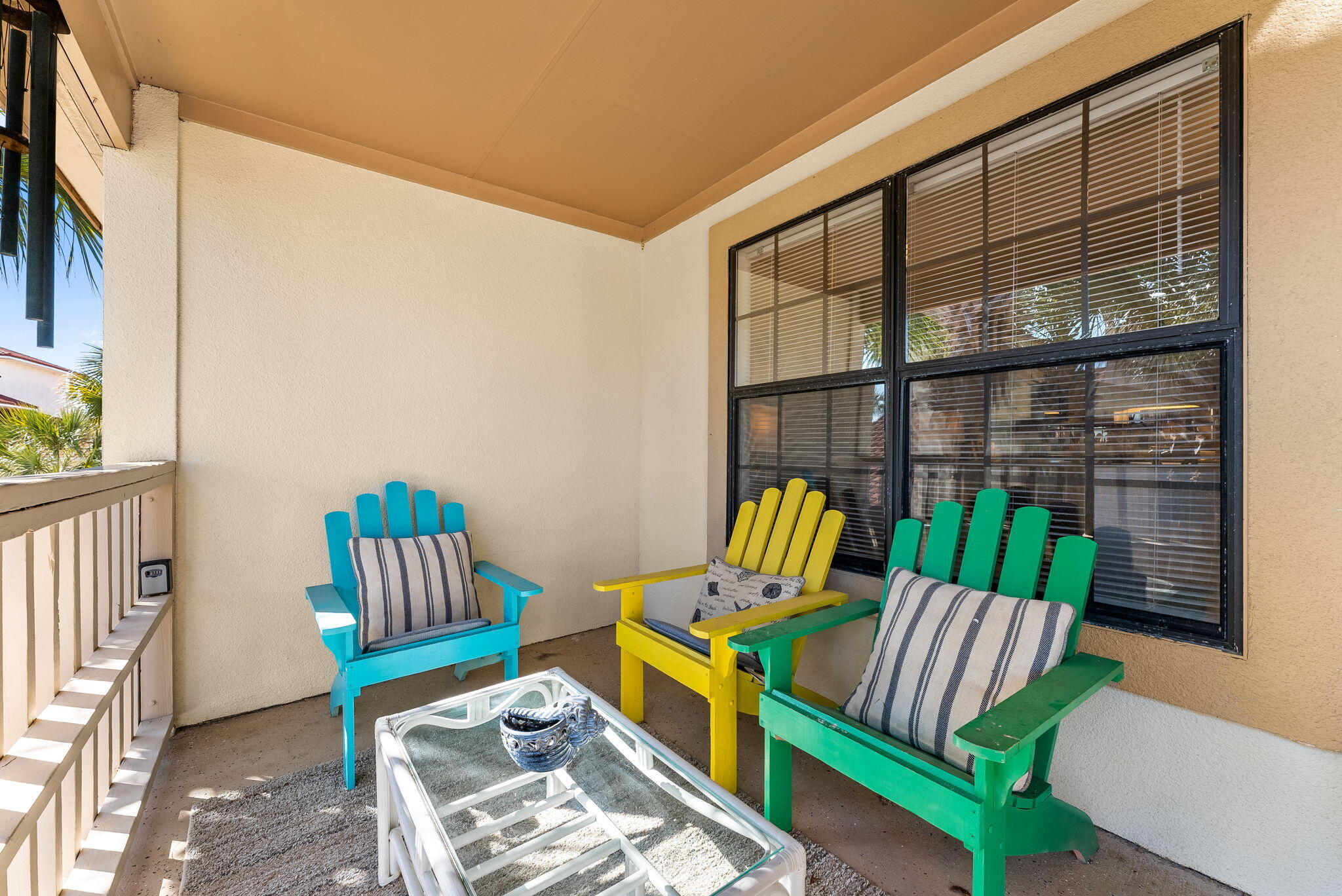 17462 Front Beach Road, Unit 73D Panama City Beach, FL 32413 - Photo 26 of 30 a view of porch with a bench