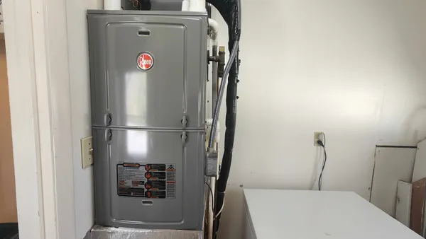 a view of a backyard with water fountain