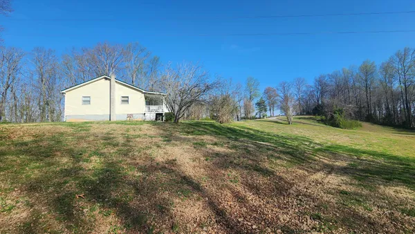 a house view with a backyard space