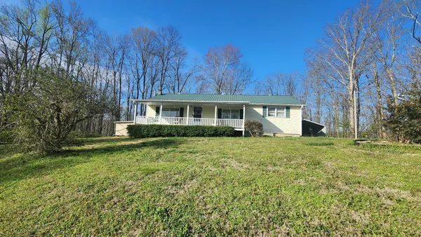 a black and white photo of a house