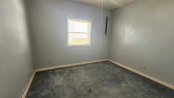 an empty room with closet