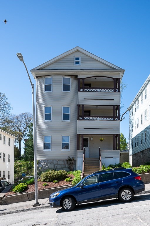 a car parked in front of a building