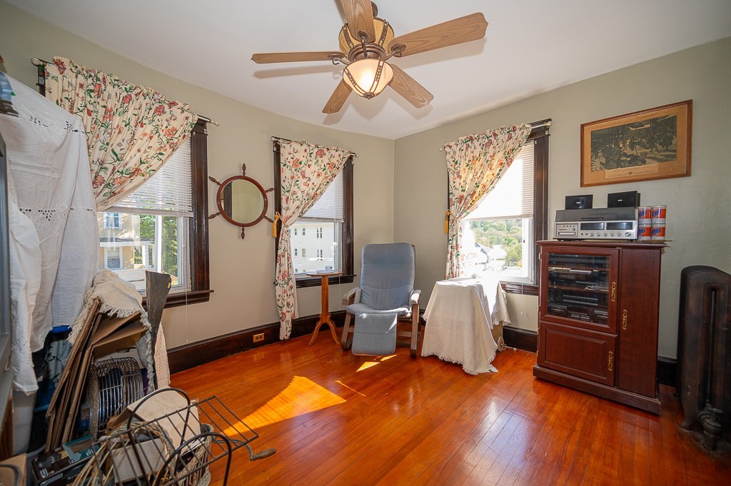 19 Fifth Avenue Worcester, MA 01607 - Photo 11 of 42 a room with furniture and a window