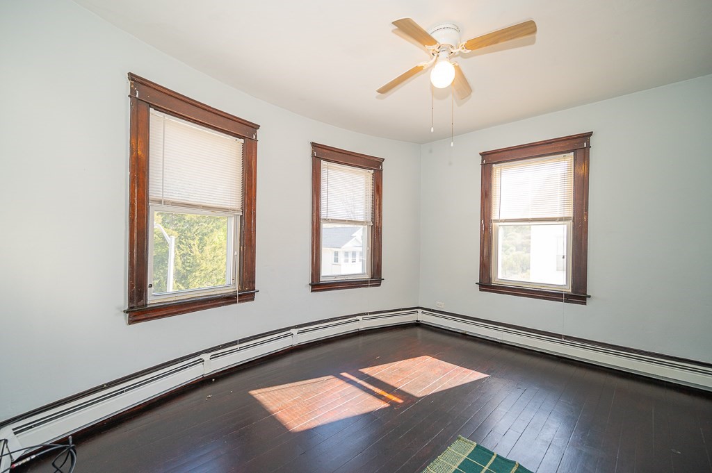 19 Fifth Avenue Worcester, MA 01607 - Photo 12 of 42 a view of a room with windows and chandelier fan