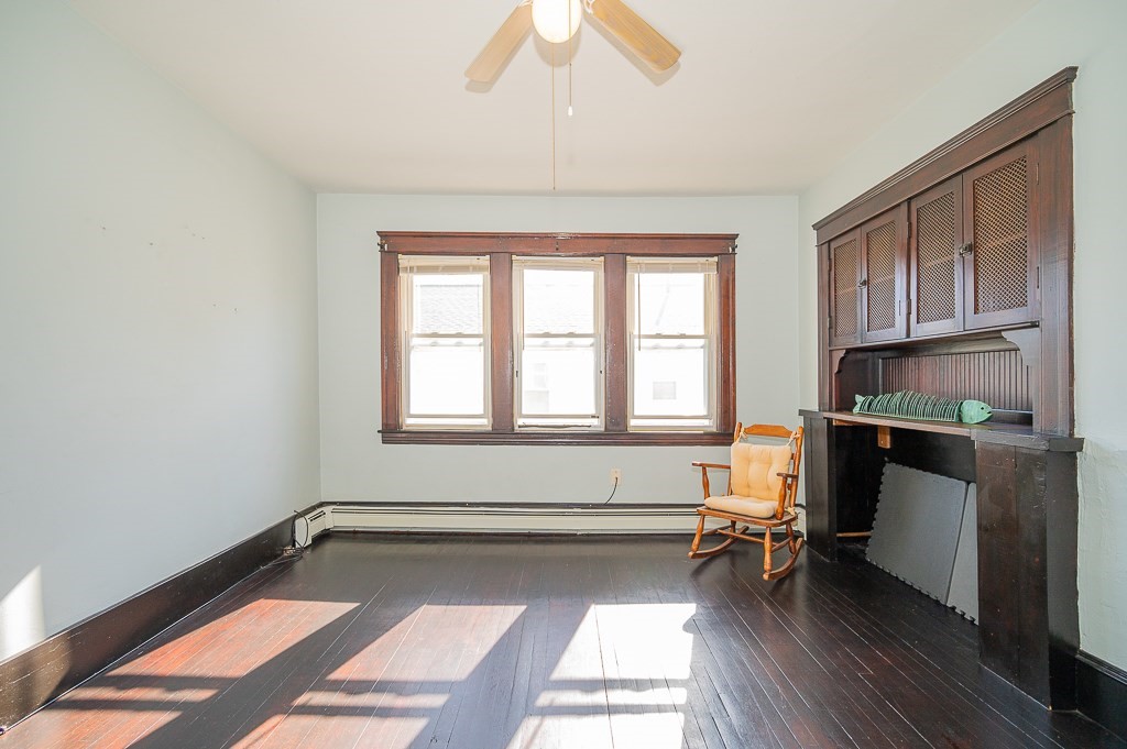 19 Fifth Avenue Worcester, MA 01607 - Photo 14 of 42 a living room with furniture and a fireplace