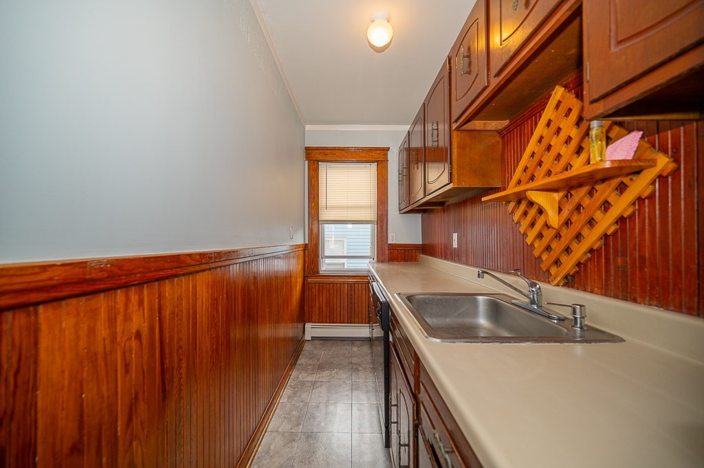 19 Fifth Avenue Worcester, MA 01607 - Photo 20 of 42 a view of kitchen and wooden floor