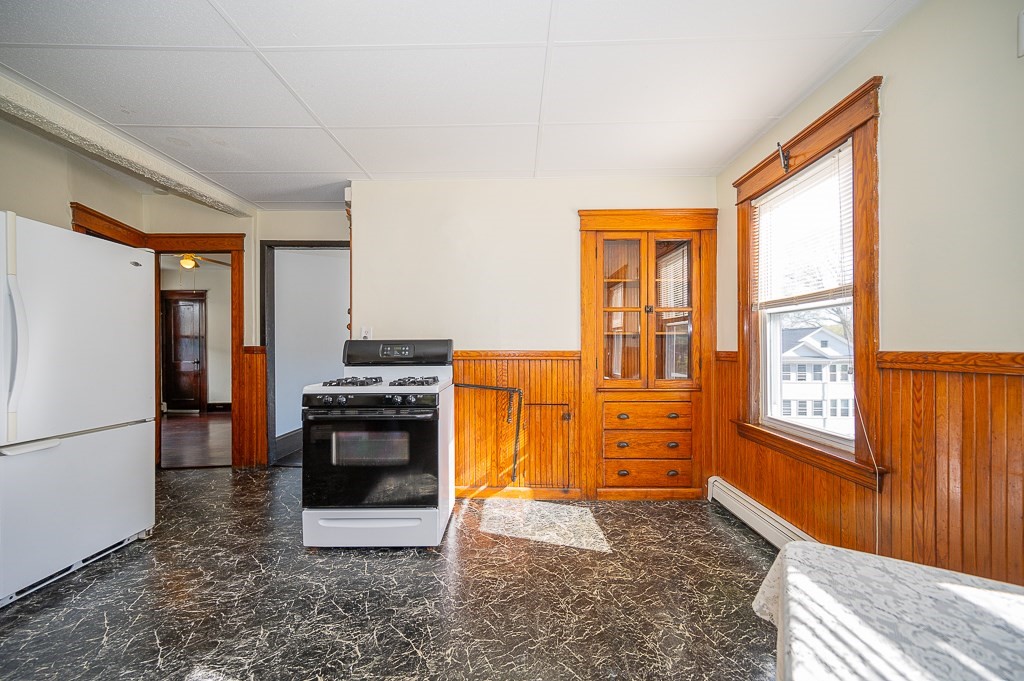 19 Fifth Avenue Worcester, MA 01607 - Photo 22 of 42 a kitchen that has a stove and a refrigerator