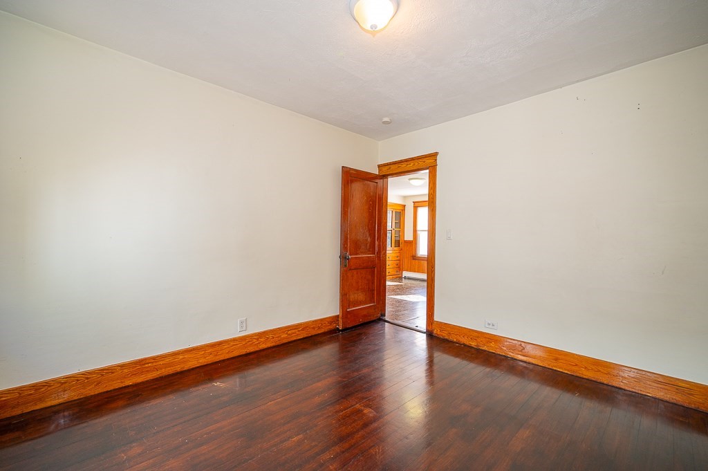 19 Fifth Avenue Worcester, MA 01607 - Photo 24 of 42 a view of empty room with wooden floor and fan